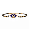 Oval Evil Eye – Black Beads Gold Bracelet